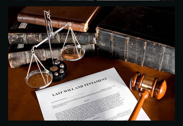 a notary scale and a gavel on a desk for Estate planning legal documents
