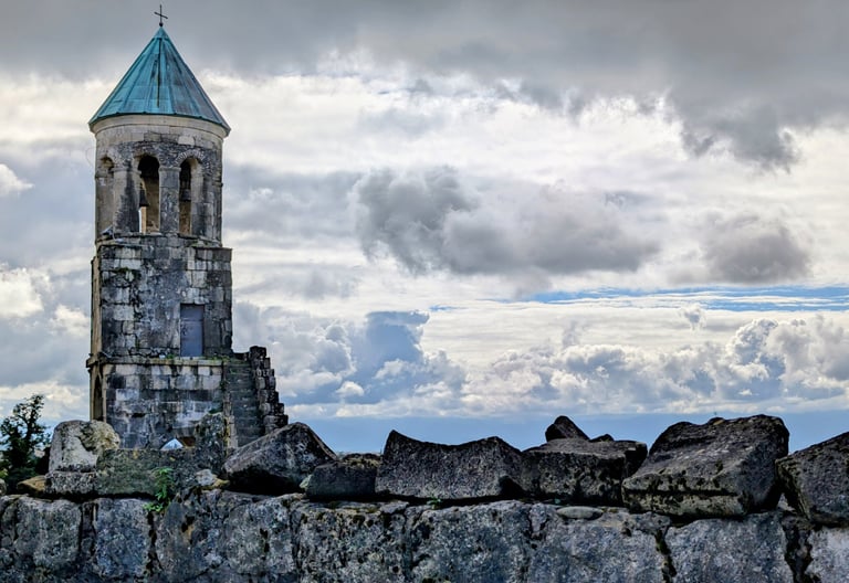 a tower and stone wall at Bagrati cathedral in Kutaisi georgia 