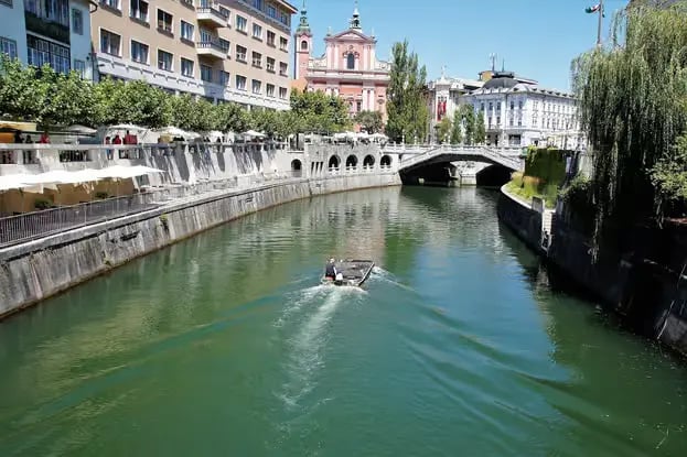 Scenic boat ride on the river in Ljubljana city center.