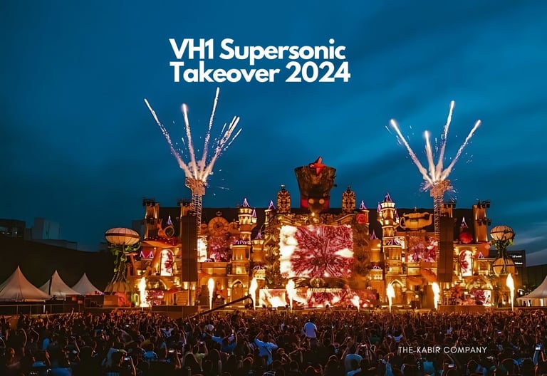 a large building with fireworks and fireworks in the background