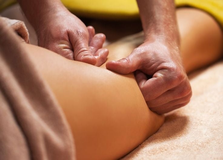 a person is getting a massage at a massage