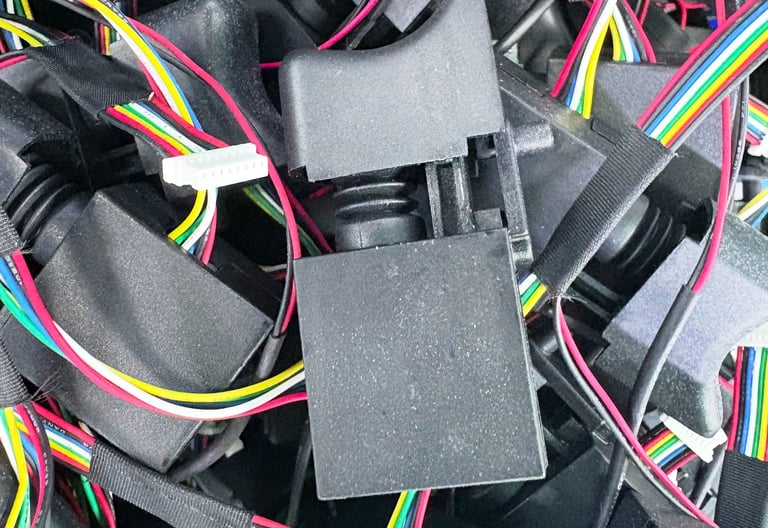 a pile of wires and wires connected to a computer