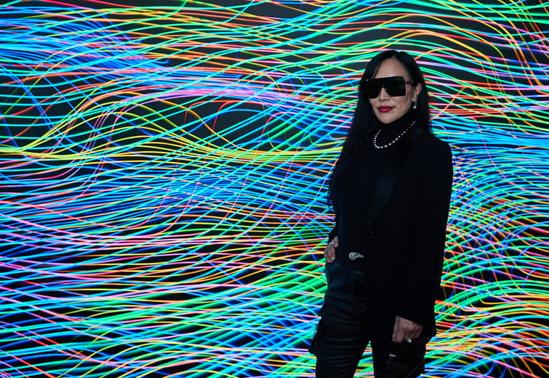 Krista Kim in front of her 'Heart Space' Digital Installation