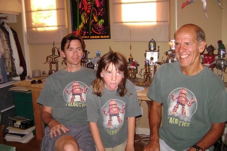 Three generations of family all wearing Talbotics t-shirts.