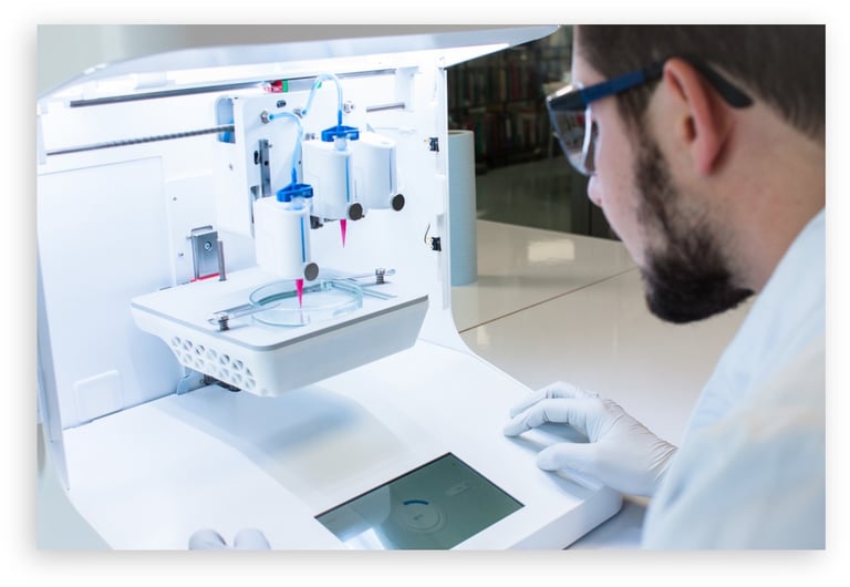 A scientist in a lab operating a 3D bioprinter to create tissue samples in a petri dish.