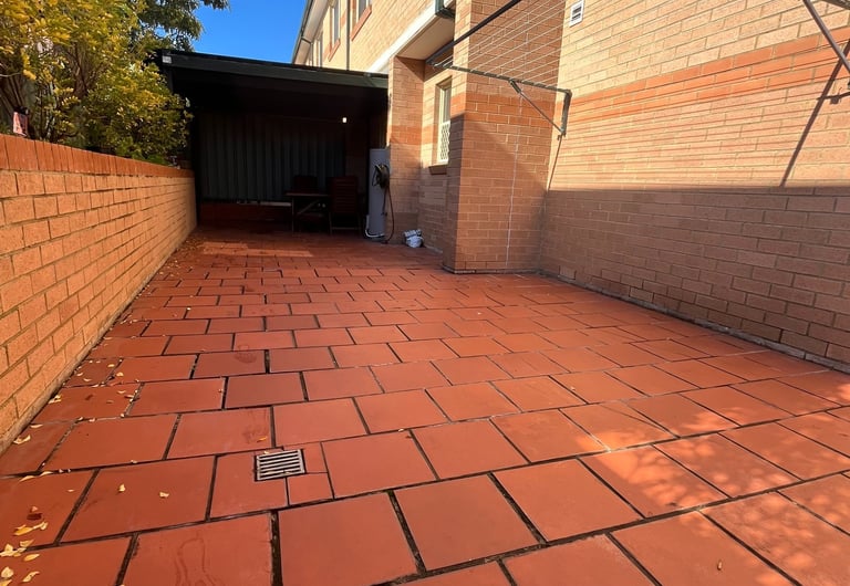Courtyard renovation with timber-look decking tiles in Sydney