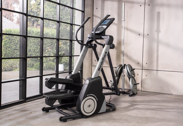 a gym equipment with a bike and a bicycle