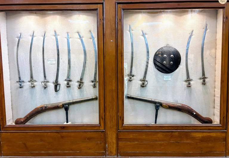 Historic weapons collection — swords, katars, and shields — at Bundi Government Museum.