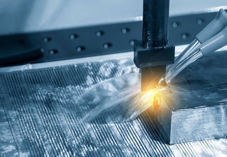 a machine is cutting a piece of metal with a laser laser