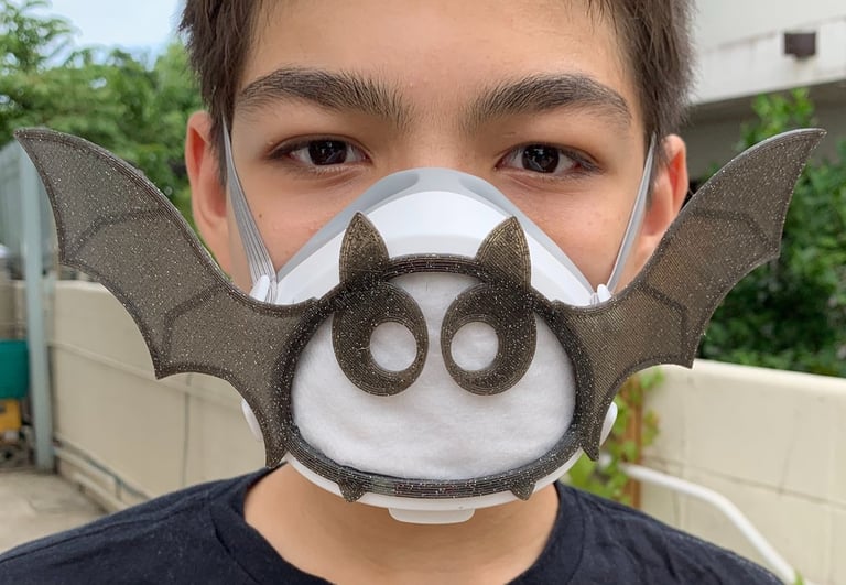 flo-2: boy with Flomask ,Batwings with eyes decoration