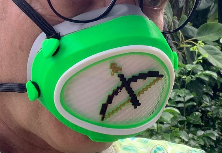 flo-55: Fluo-green Flomask cover and Minecraft Bow decoration