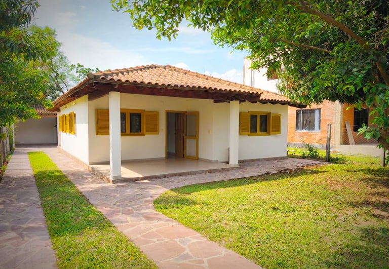 Zum Kauf: Einzugsbereites Wohnhaus mit Carport in Melgarejo, Colonia Independencia, Paraguay