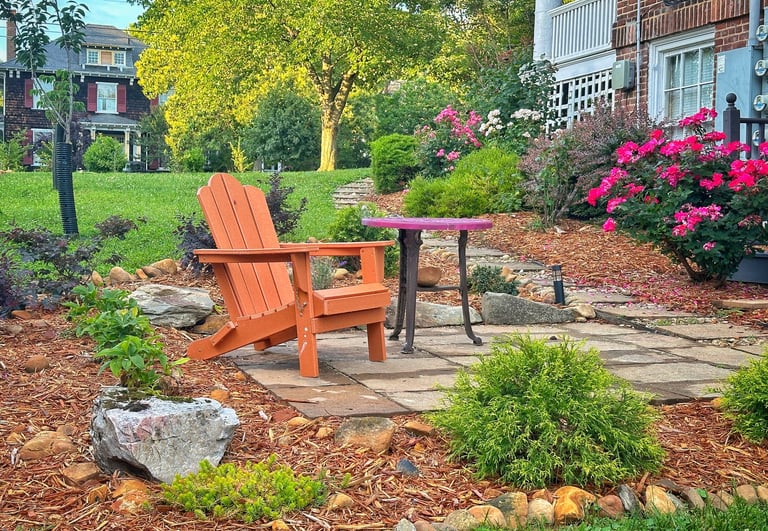 a wooden chair with a table and chairs