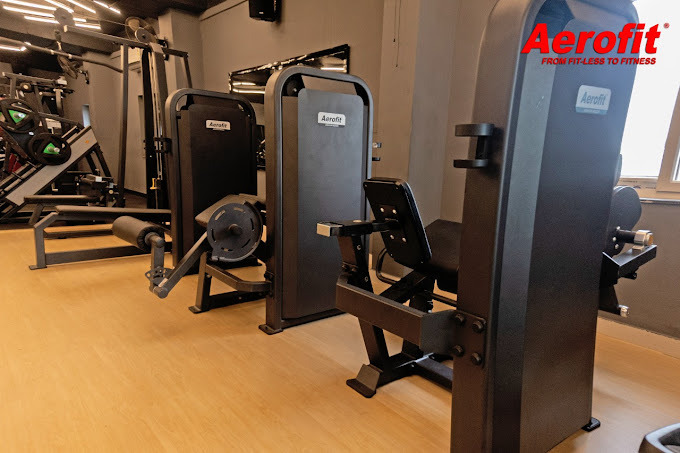 a gym room with a gym equipment and a gym equipment