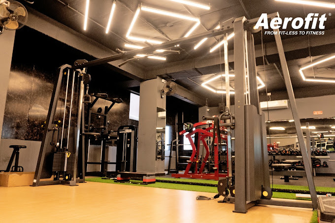 a gym room with a gym equipment and a gym equipment