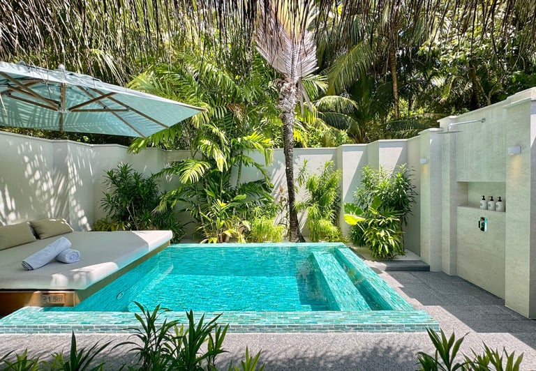 Huvafen Fushi Maldives deluxe beach bungalow with pool outdoor bathroom