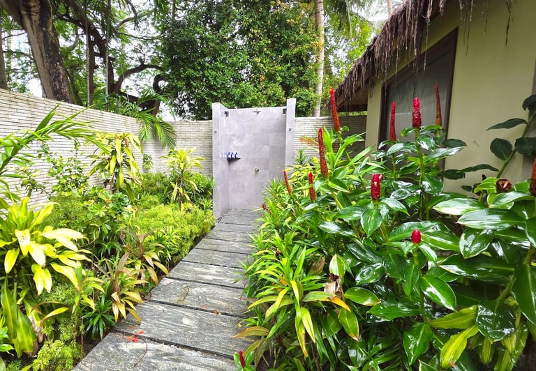 Baros Maldives baros residence outdoor shower