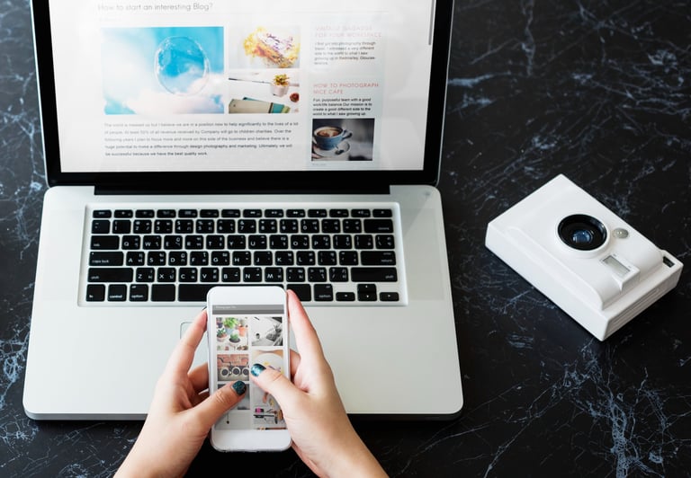 Professional person using a laptop with digital email marketing icons and notification alerts.
