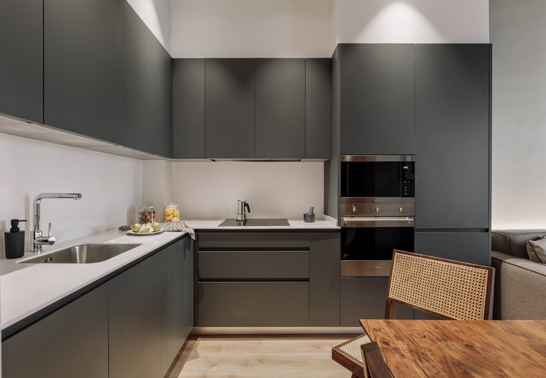 Integrated modern dark grey kitchen with modern design elements and lighting