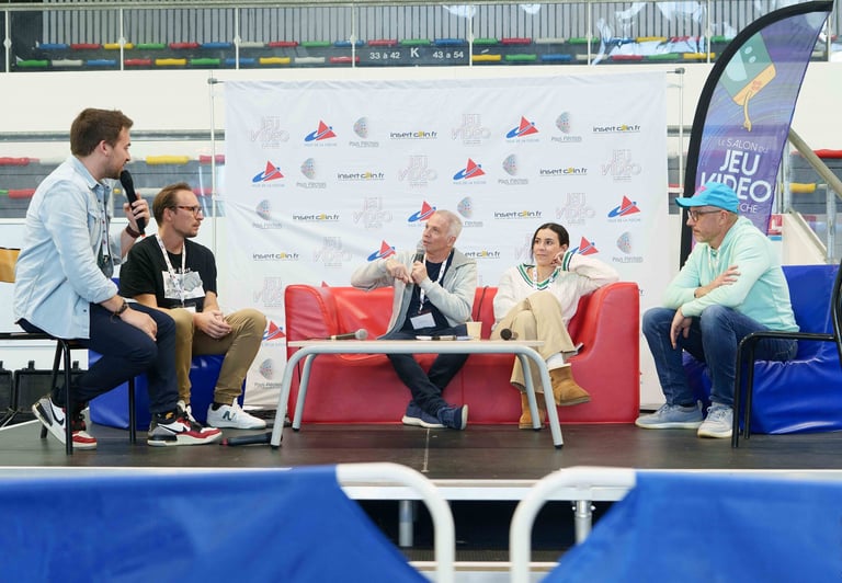 a group of people sitting on a stage