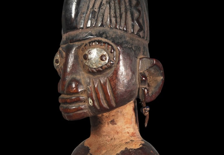 ibeji-signification-symbolisme-metal-yeux-jumeaux-ibedji-iron-gun