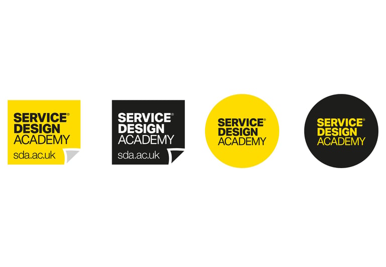 Service Design Academy logos in yellow and black circular and square shapes with website url.