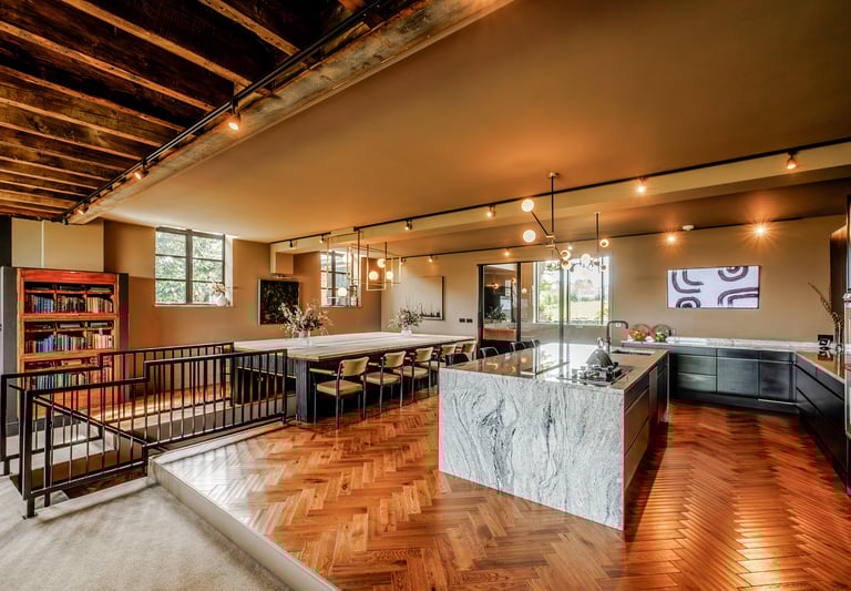 a kitchen with a marble counter top