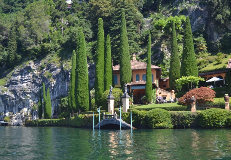 Magnificent private villa overlooking Lake Como with gardens and panoramic views.
