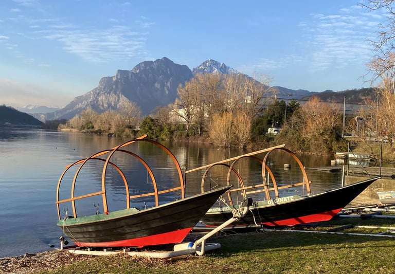 Traditional Lake Como boats called 'Lucie' floating on the water