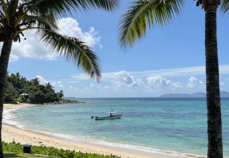 A stunning oceanfront villa with floor-to-ceiling windows overlooking the Kona coastline at sunset.