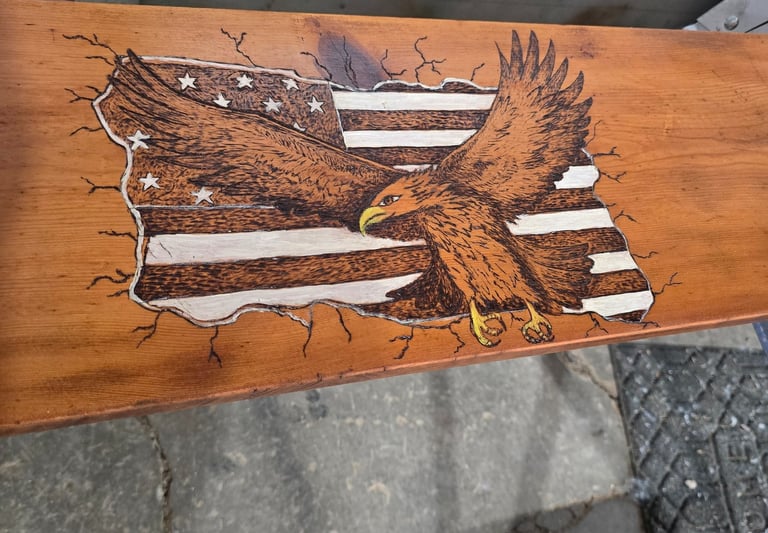 eagle wood burned on a shelf