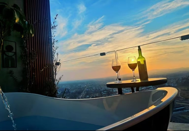 a wine glass with wine glasses and a bottle of wine