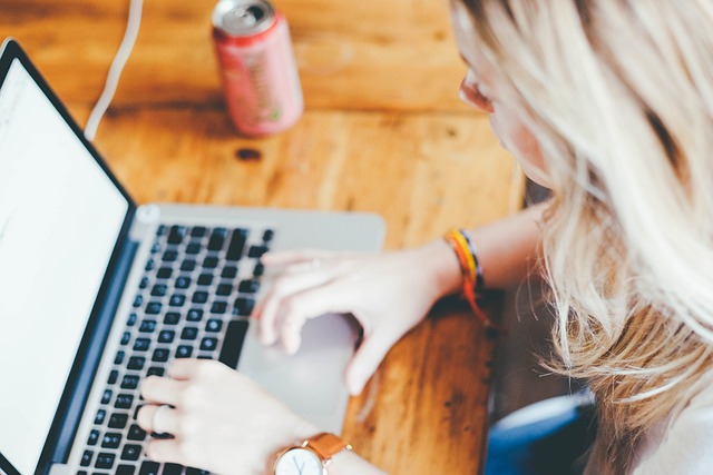 Person is typing on laptop marketing