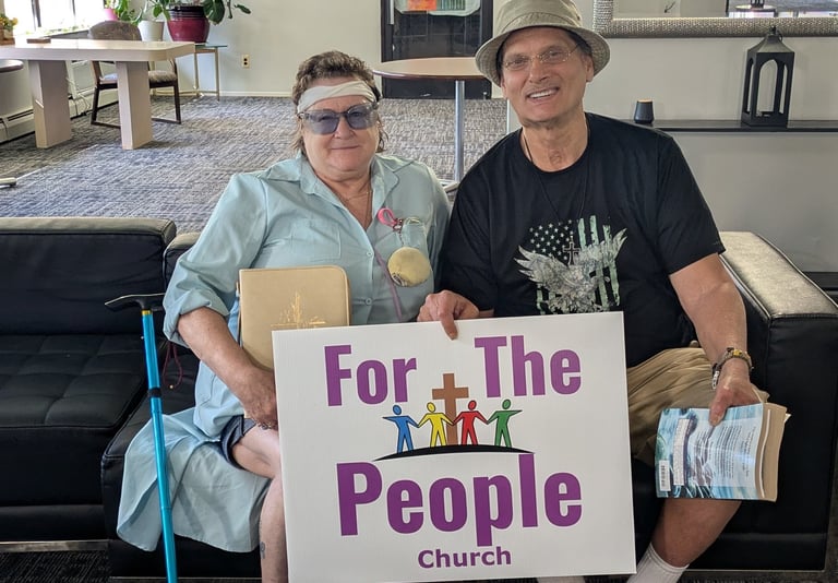 Brenda and Carl holding their bibles after an uplifting bible study.