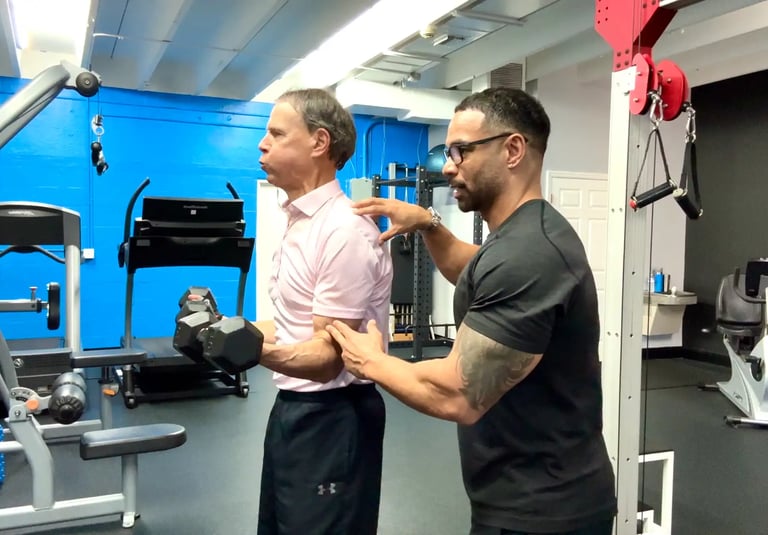 weight training session with senior male