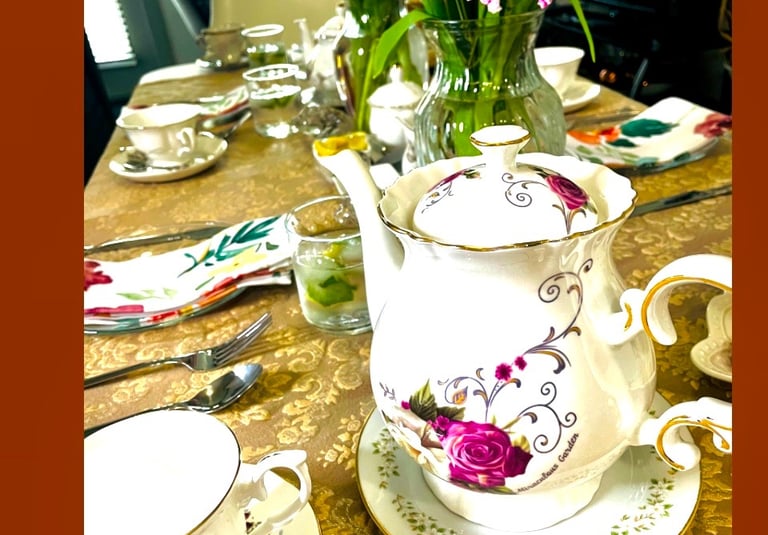 a table with a vase of flowers in a vase