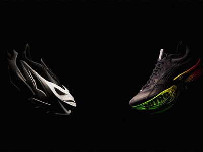 a pair of two shoes one in black, white and grey the other in a black colorway w/yellow and green 