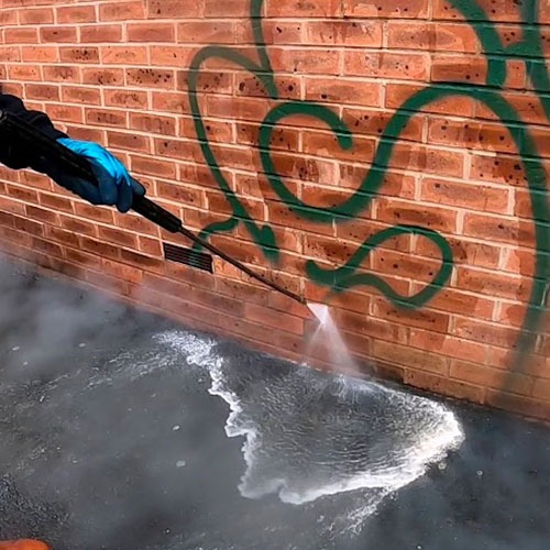 Graffiti removal with hot water pressure washing in Renton, WA