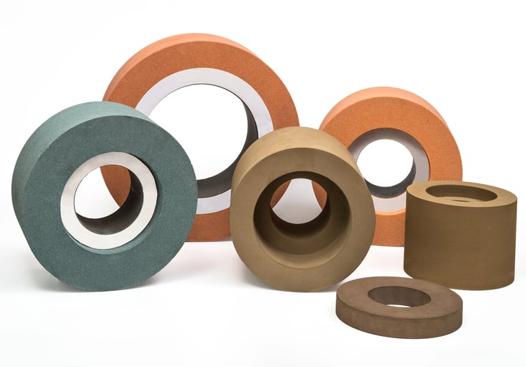 Bonded abrasive grinding and polishing wheels for precision surface finishing