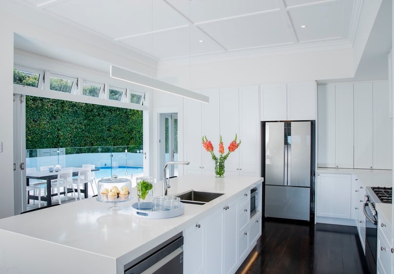white kitchen in renovated bungalow