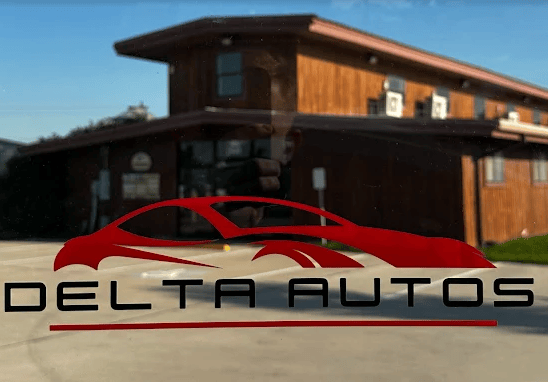 The building and logo of Delta Autos in Fort Worth