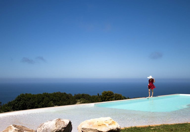 a lady at a pool at Misty Mountain Reserve for a fitness holiday