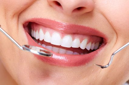 Dental crown bridge implant to restore function to bite eat and smile