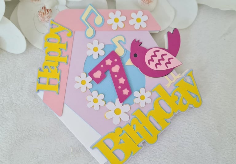 Birthday card with flower, bird and Happy Birthday sentiment. Made with Cricut.