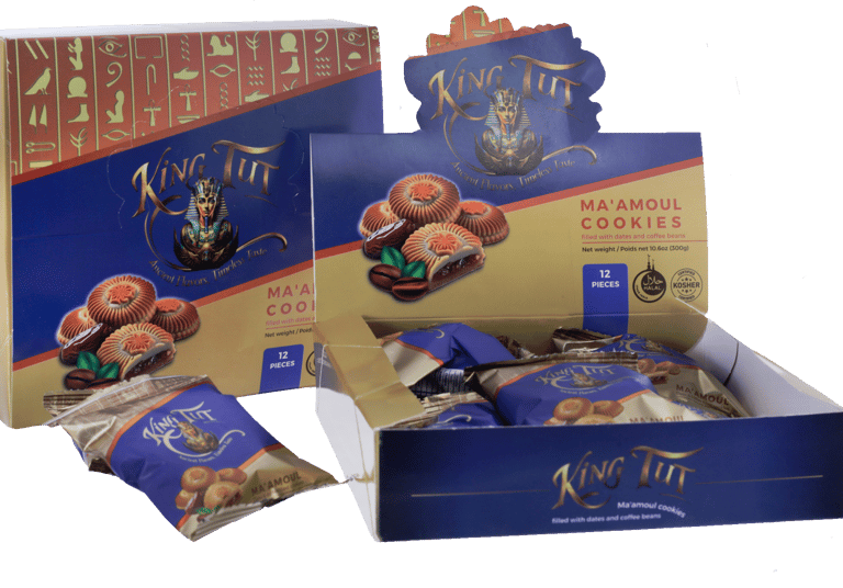 Box of King Tut Ma'amoul cookies filled with dates and coffee beans in a blue display box.