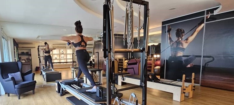 Pilates practitioner using tower equipment at The Pilates Room Bangsar