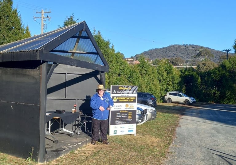 Graham from RCQ mans the gates whilst waiting for customers to come and cheer on the Tigers AFL game