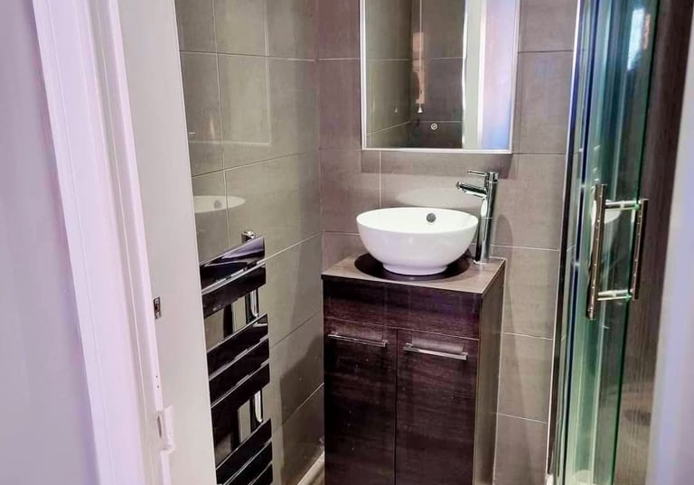 en suite shower room with toilet
