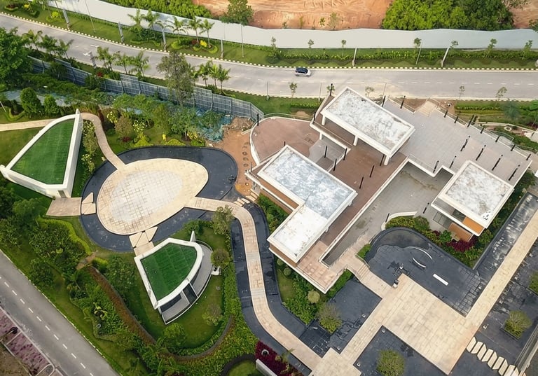 Aerial view of commercial landscape design with turf and garden beds – Yie Yang Landscape