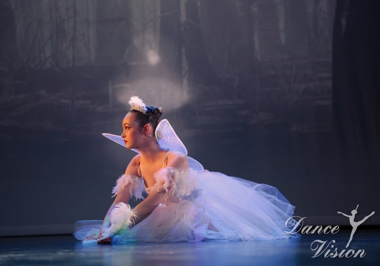 a young girl in a white dress and a white dress
